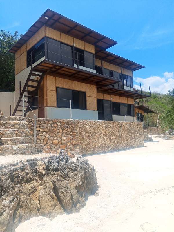 Two-Storey 4 Bedroom Beachhouse with Pool photo
